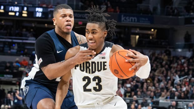 Jaden Ivey gets pressured by Myles Dread in Purdue's game against Penn State.